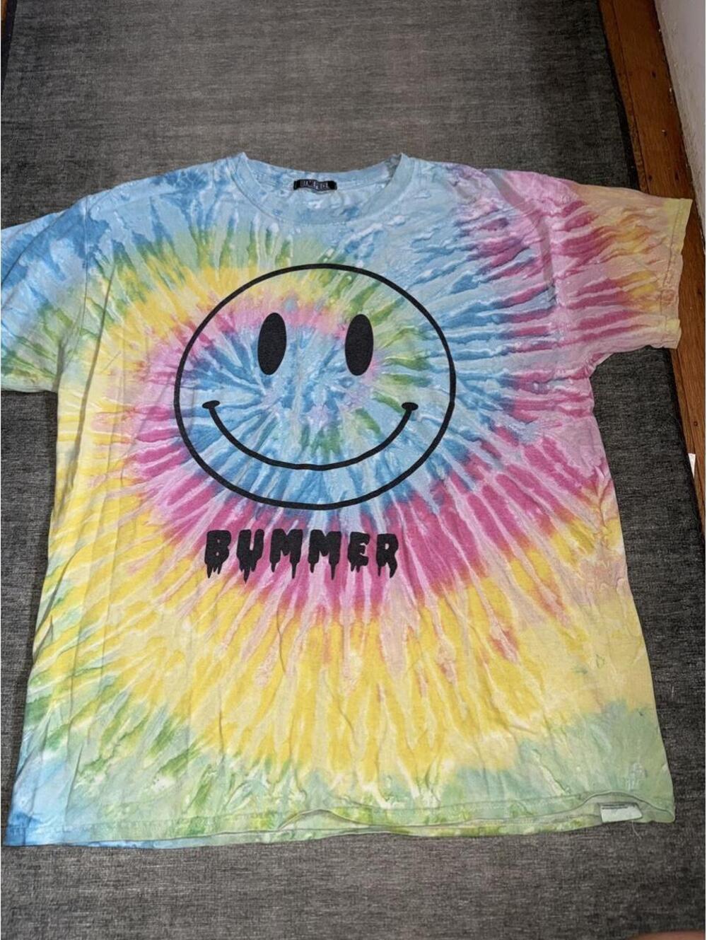 DXMepiece Bummer tie-dye tee with black smiley face graphic